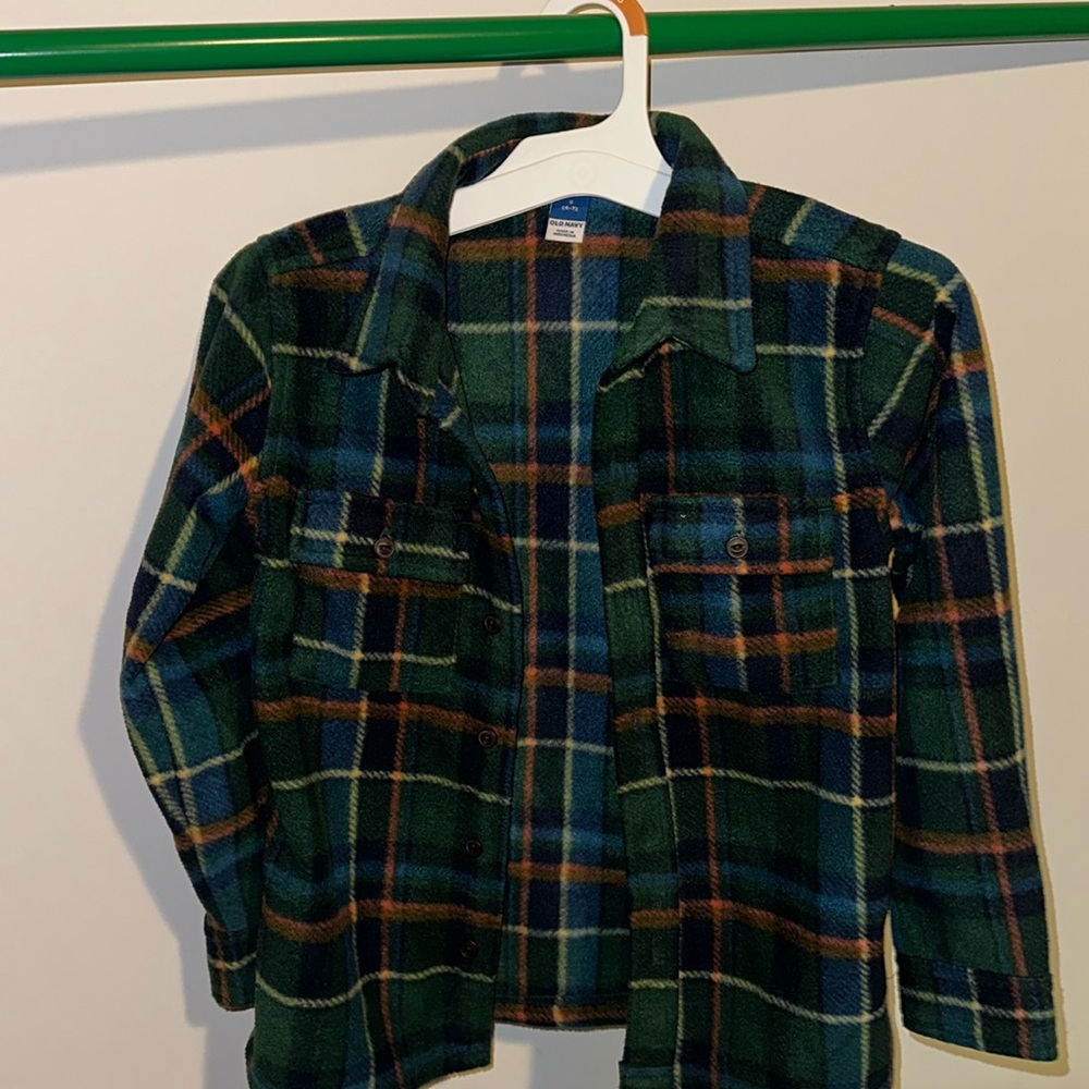 Long sleeved fleece button down top.